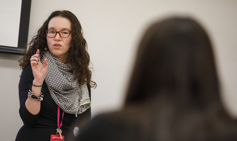A professor teaching a student in a classroom