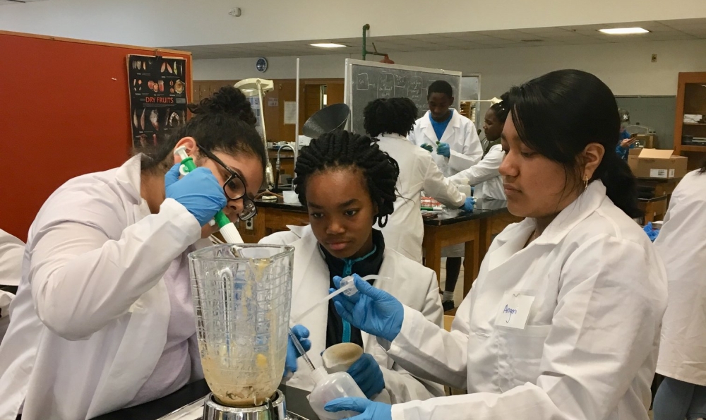 STEP students in lab coats