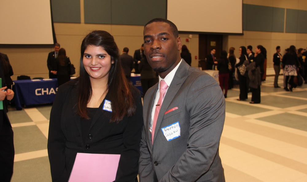 Two school of business students in multi-purpose room