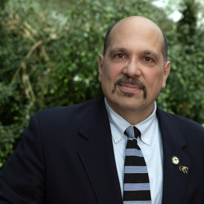 Headshot of Gary Levanti in a suit and tie