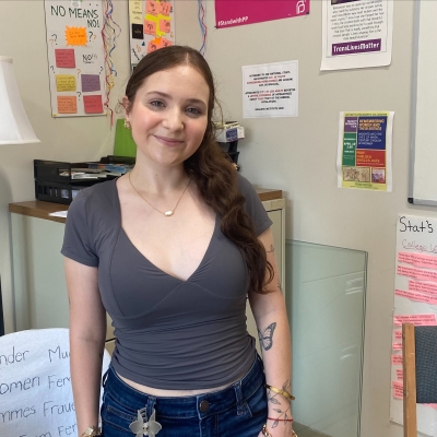 woman poses in room